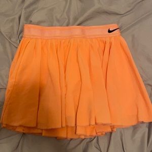 bright orange nike tennis skirt